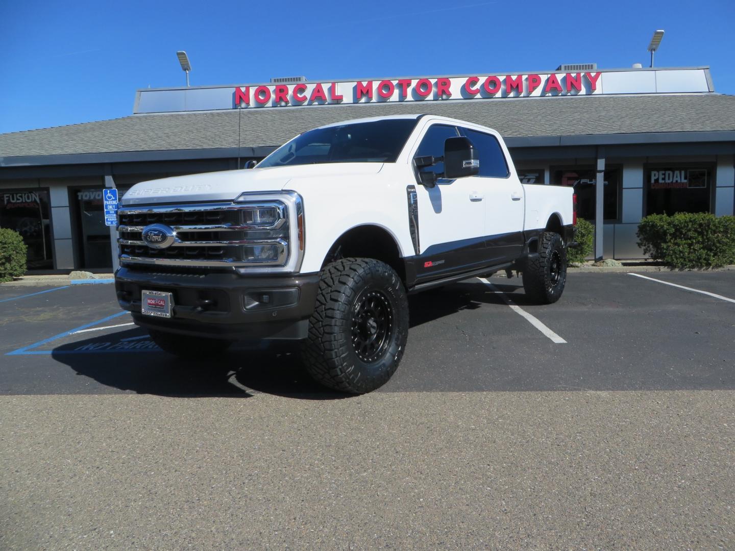 2024 White /BROWN Ford F-250 SD King Ranch Crew Cab 4WD (1FT8W2BM0RE) with an 6.7 HI OUTPUT POWER STROKE engine, 10-SPEED AUTO TORQSHIFT transmission, located at 2630 Grass Valley Highway, Auburn, CA, 95603, (530) 508-5100, 38.937893, -121.095482 - New 24 King Ranch featuring a BDS 3" radius arm suspension system, Fox 2.5 Performance Elite series shocks, Fox ATS steering stabilizer, 37" Nitto Ridge Grappler tires, 18" Method MR315 wheels, 2wd front bumper valance, B&W Tow and Stow hitch, and a Bolt Lock. - Photo#0